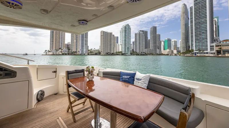 Aft deck table with the Brickell skyline behind the Azimut L'chaim