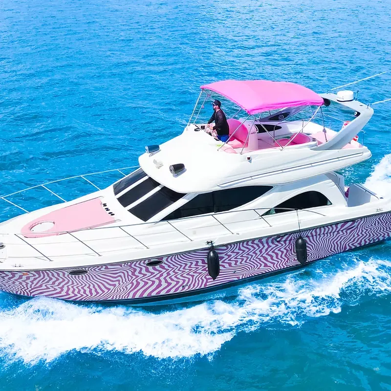 Maxum 46 flybridge yacht cruising off Miami