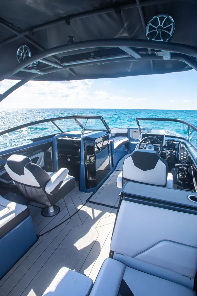 Helm and cockpit of the Yamaha 255XD on clear Biscayne Bay water